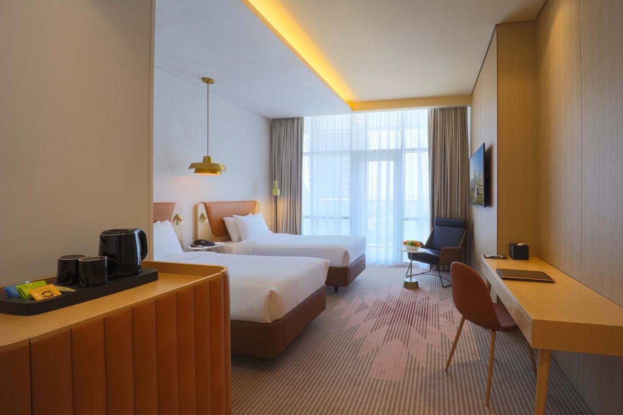 Novotel Jumeirah Village Triangle Dubai Exterior foto